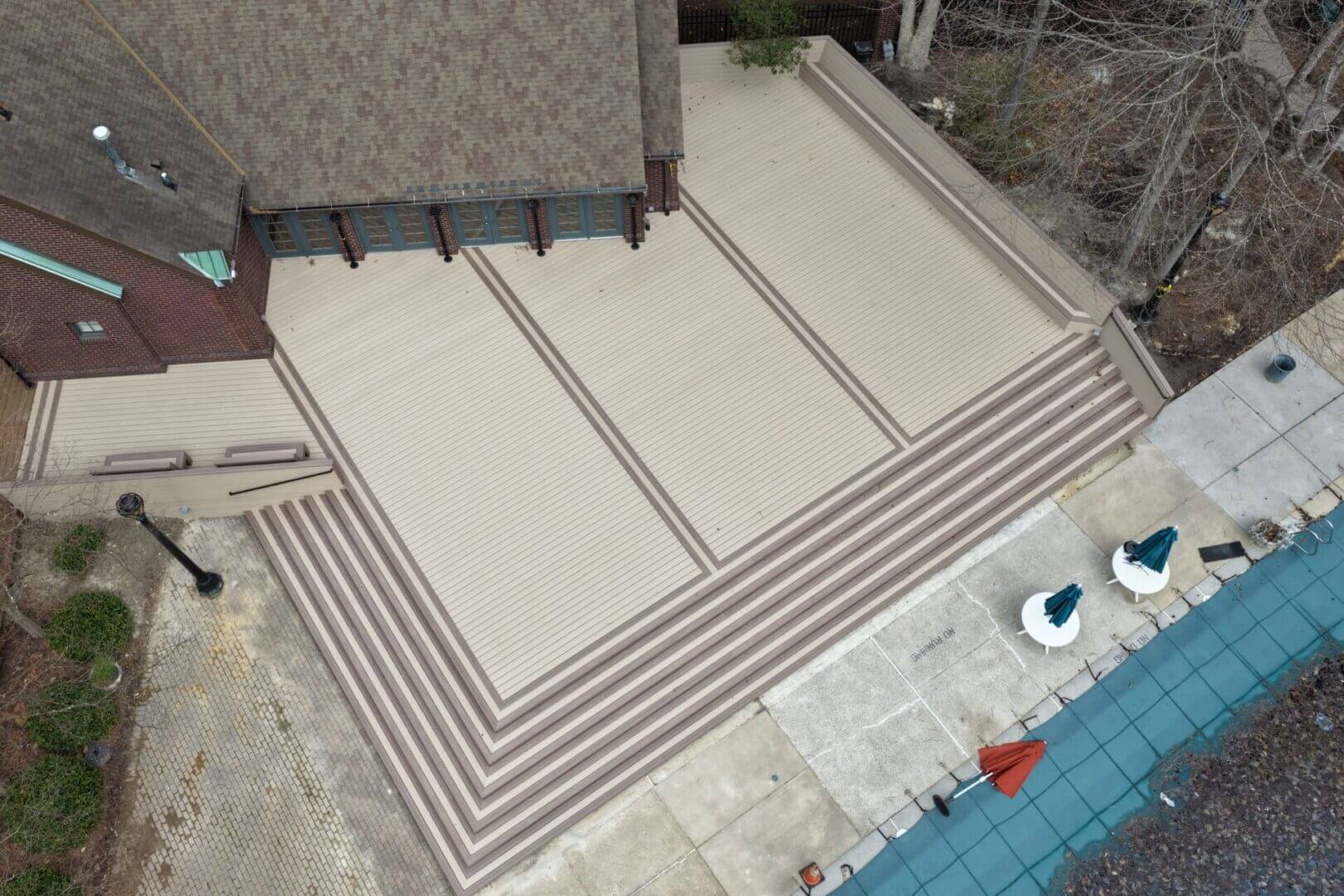 Aerial view of large custom outdoor living project in Hampton Roads
