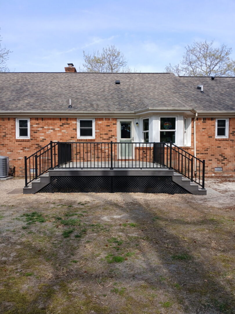 Finished composite deck with custom railing details