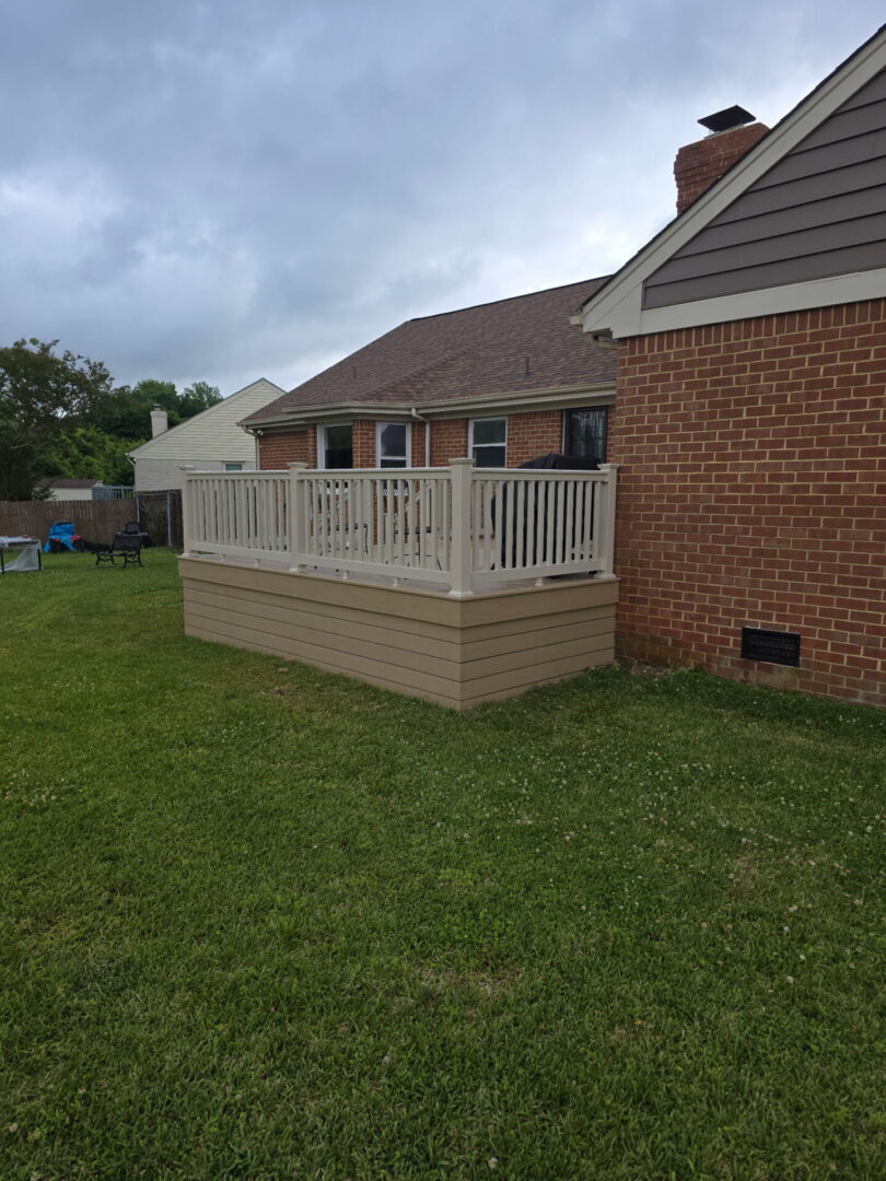 Premium composite deck and outdoor living project by B&B Decks
